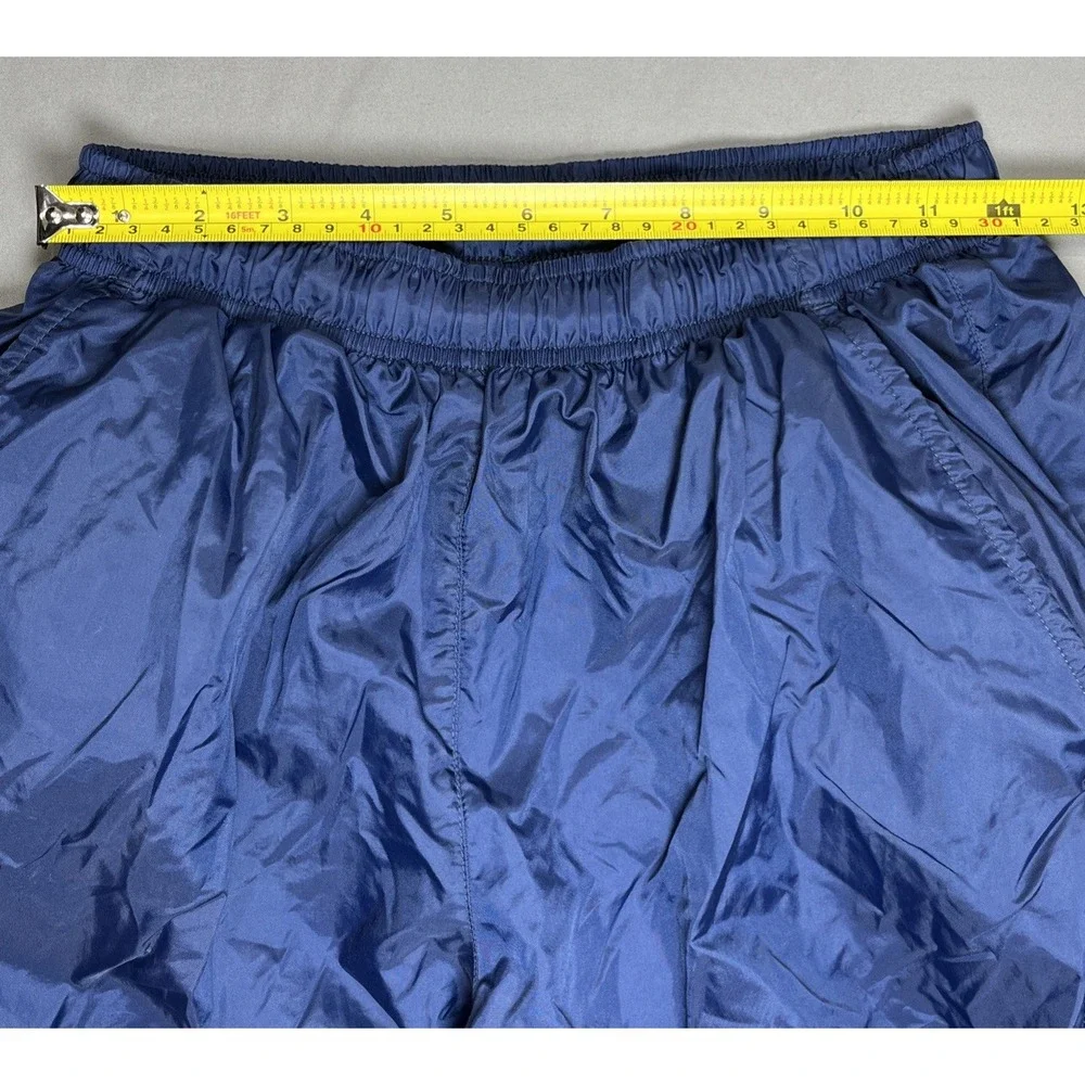Vintage Nike Youth M (8-10) Blue Nylon Track Pants Zip Ankle Cinch Waist Retro